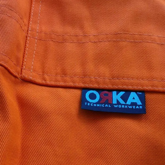 FR7344_ORKA Zip Fabricator FR Coverall_Woven Label