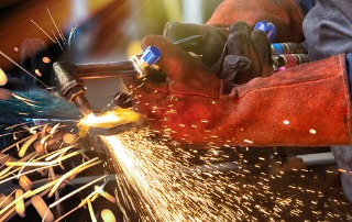 african man with a cutting torch picture id1171875822
